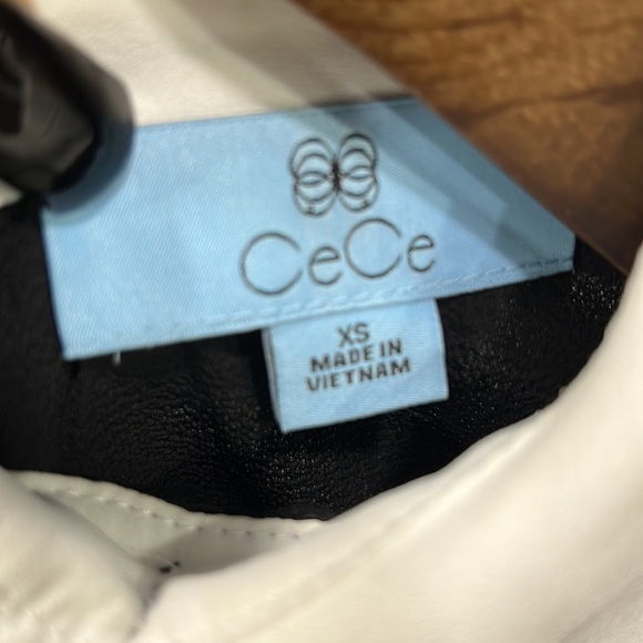 CeCe Classy Black/White blouse. New w tags. Size XS. - Picture 4 of 7